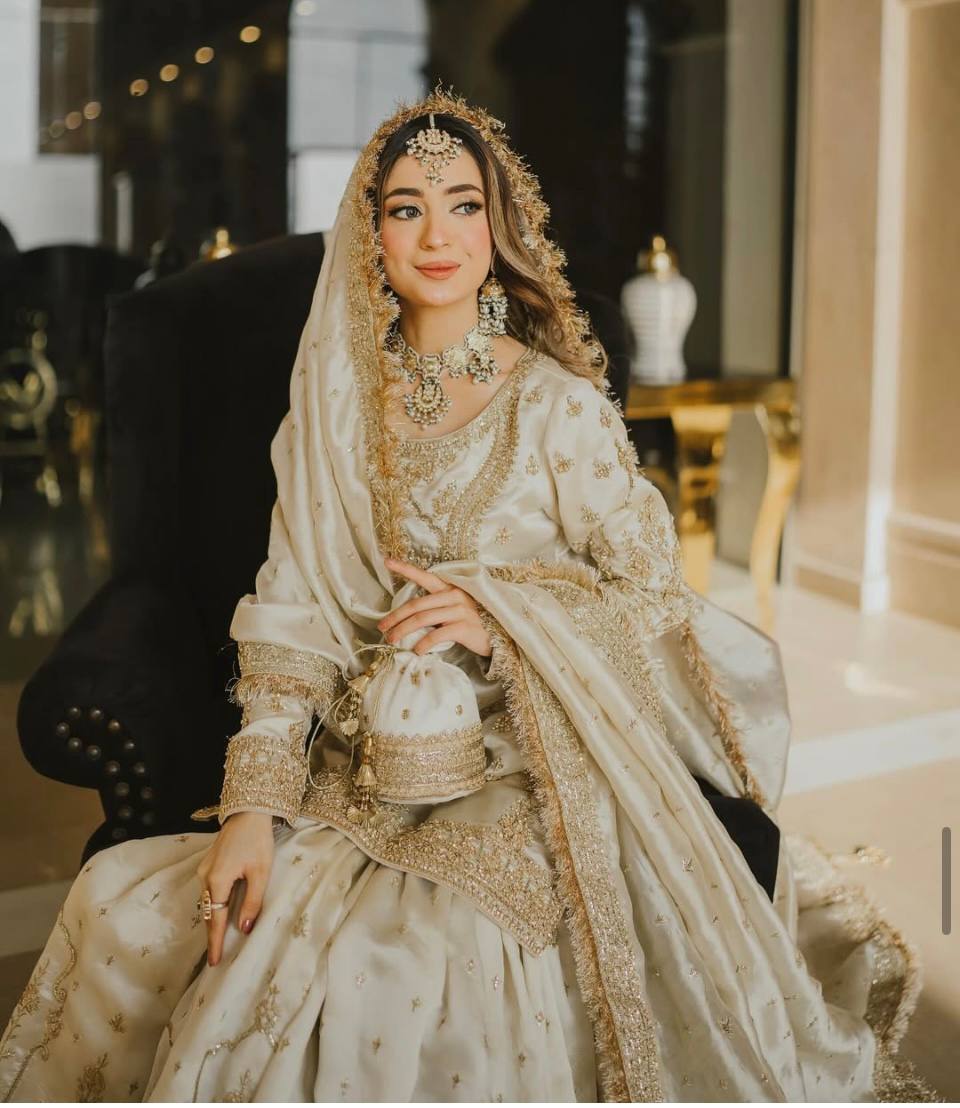 A Timeless Portrait of a Beautiful Adorned in Traditional Wedding Attire