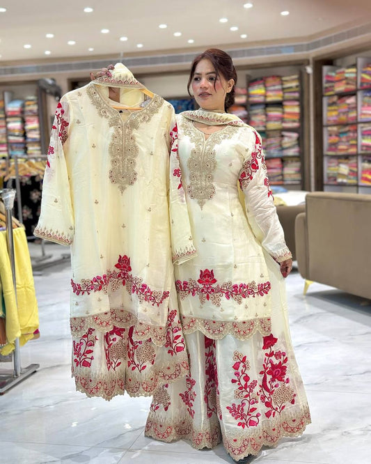 A Fashionable Woman in a White and Pink Suit Ensemble