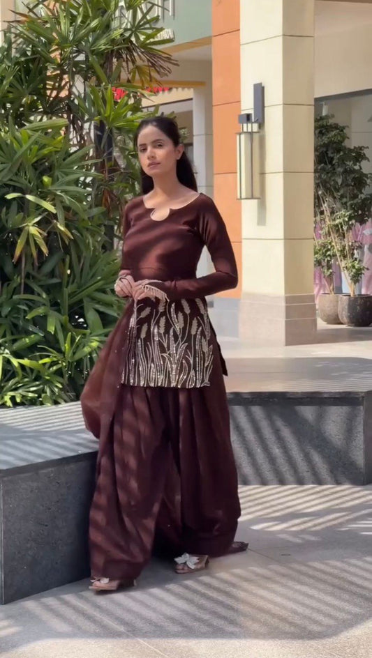 A Captivating Moment of Grace in a Brown Dress