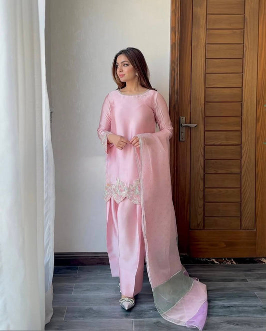 A Fashion-Forward Woman in Pink Suit